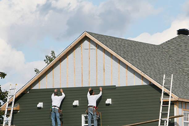 Professional Siding Repair technician working in Washington, IN